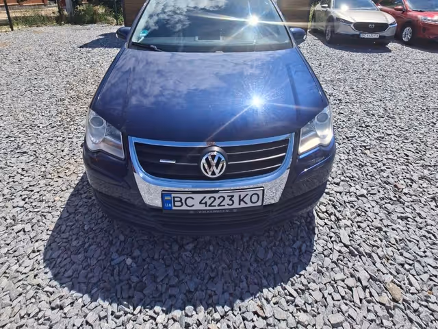 Volkswagen Touran - фото 3