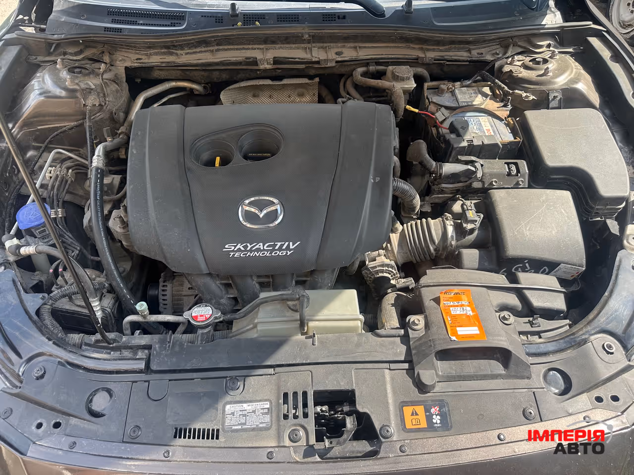 Mazda 3 - фото 11