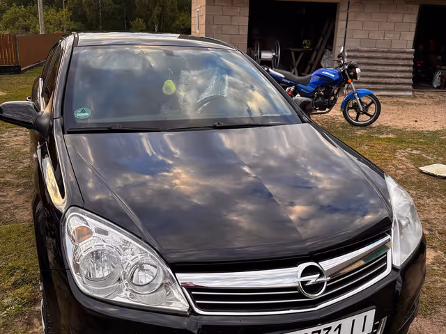 Opel Astra - фото 1