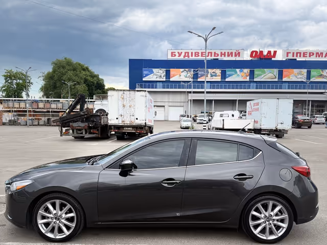 Mazda 3 - фото 5