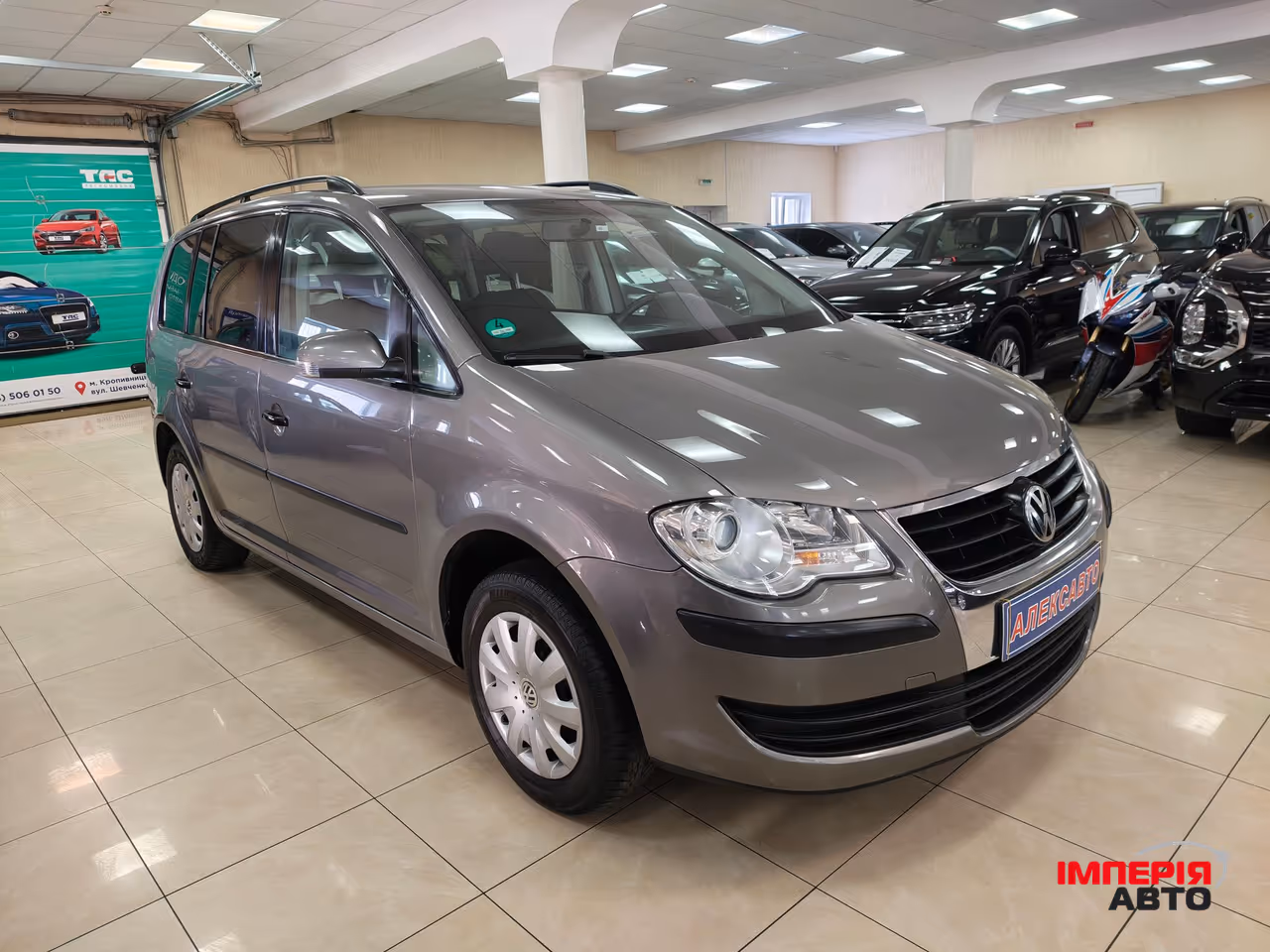 Volkswagen Touran - фото 3