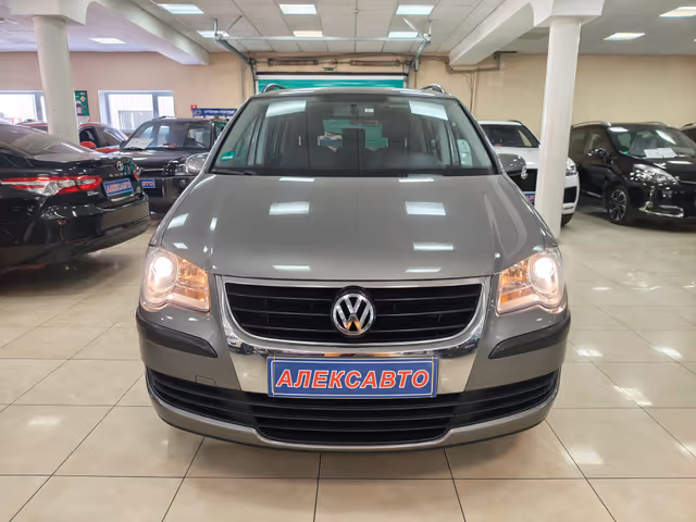 Volkswagen Touran - фото 4