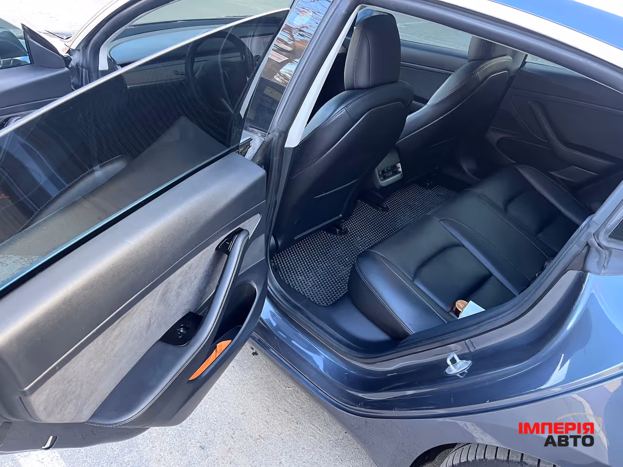 Tesla Model 3 - фото 10