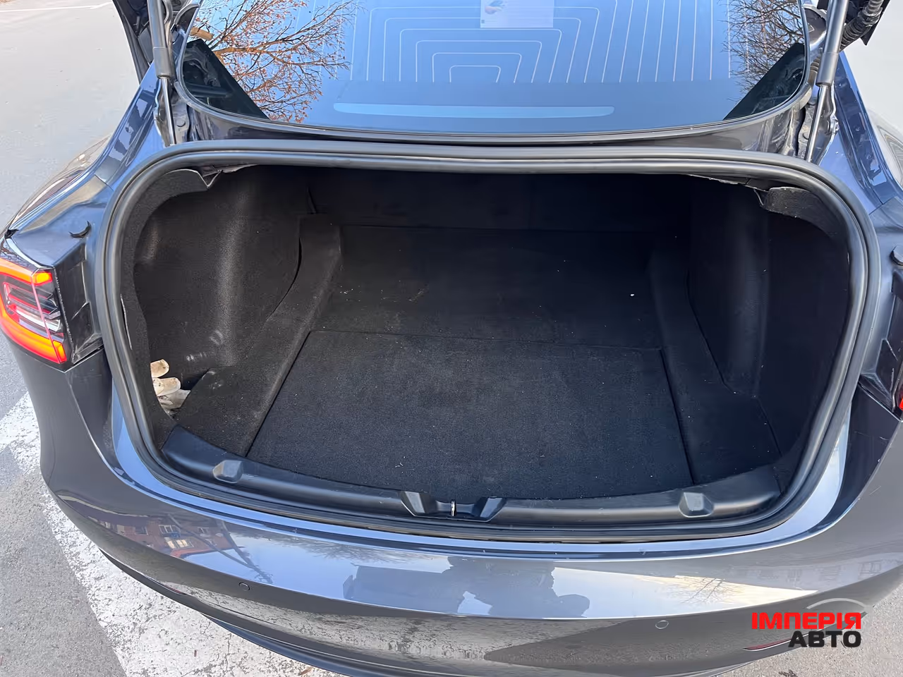 Tesla Model 3 - фото 11