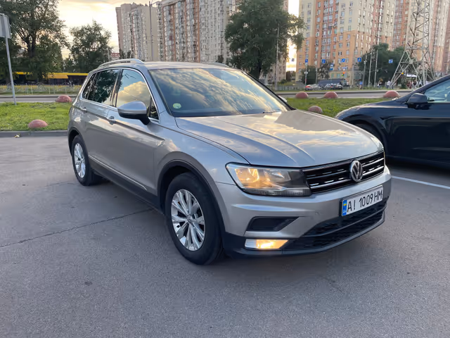 Volkswagen Tiguan - фото 1