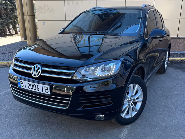 Volkswagen Touareg - фото 1