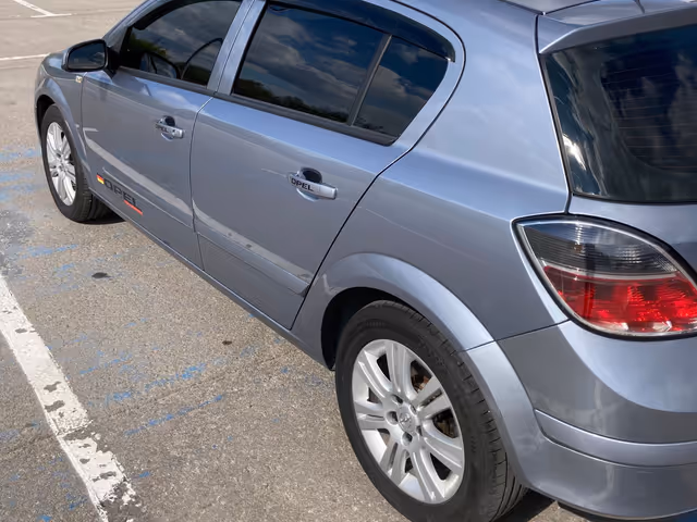 Opel Astra - фото 1
