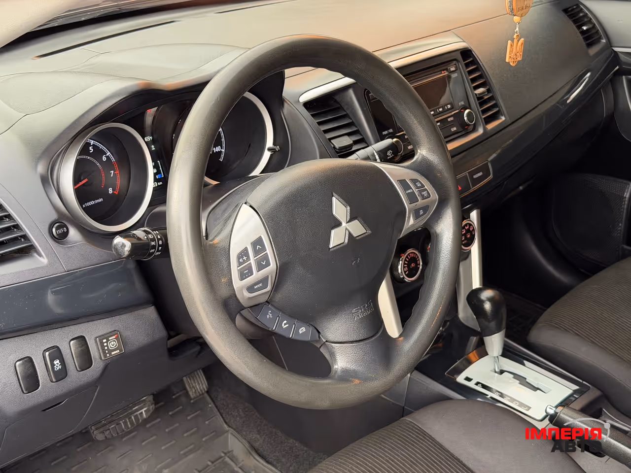 Mitsubishi Lancer - фото 39