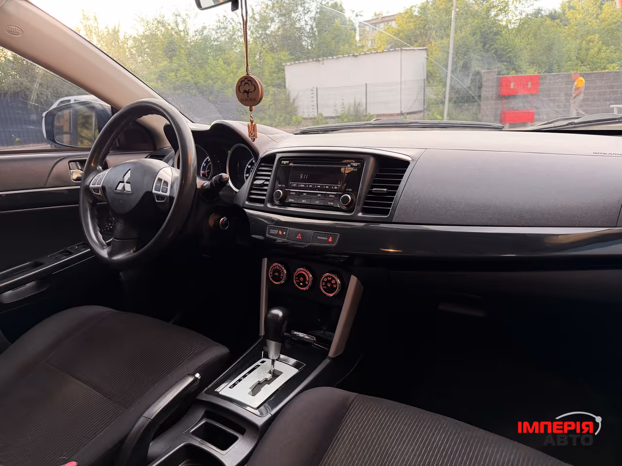 Mitsubishi Lancer - фото 13