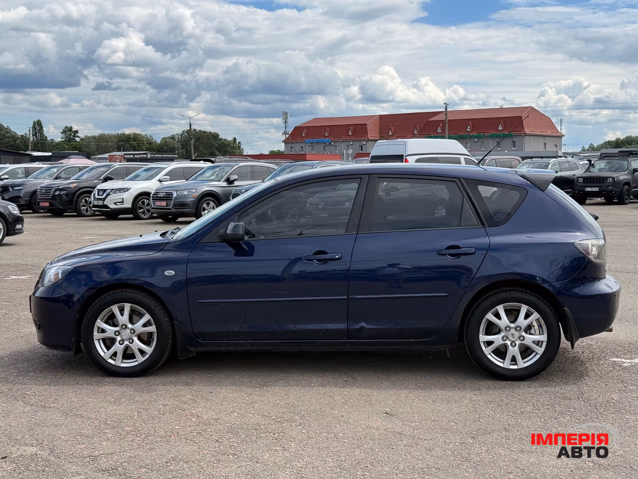 Mazda 3 - фото 7