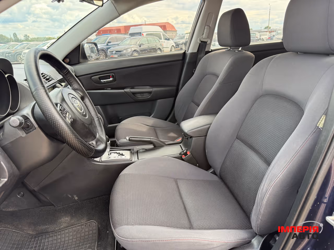 Mazda 3 - фото 9