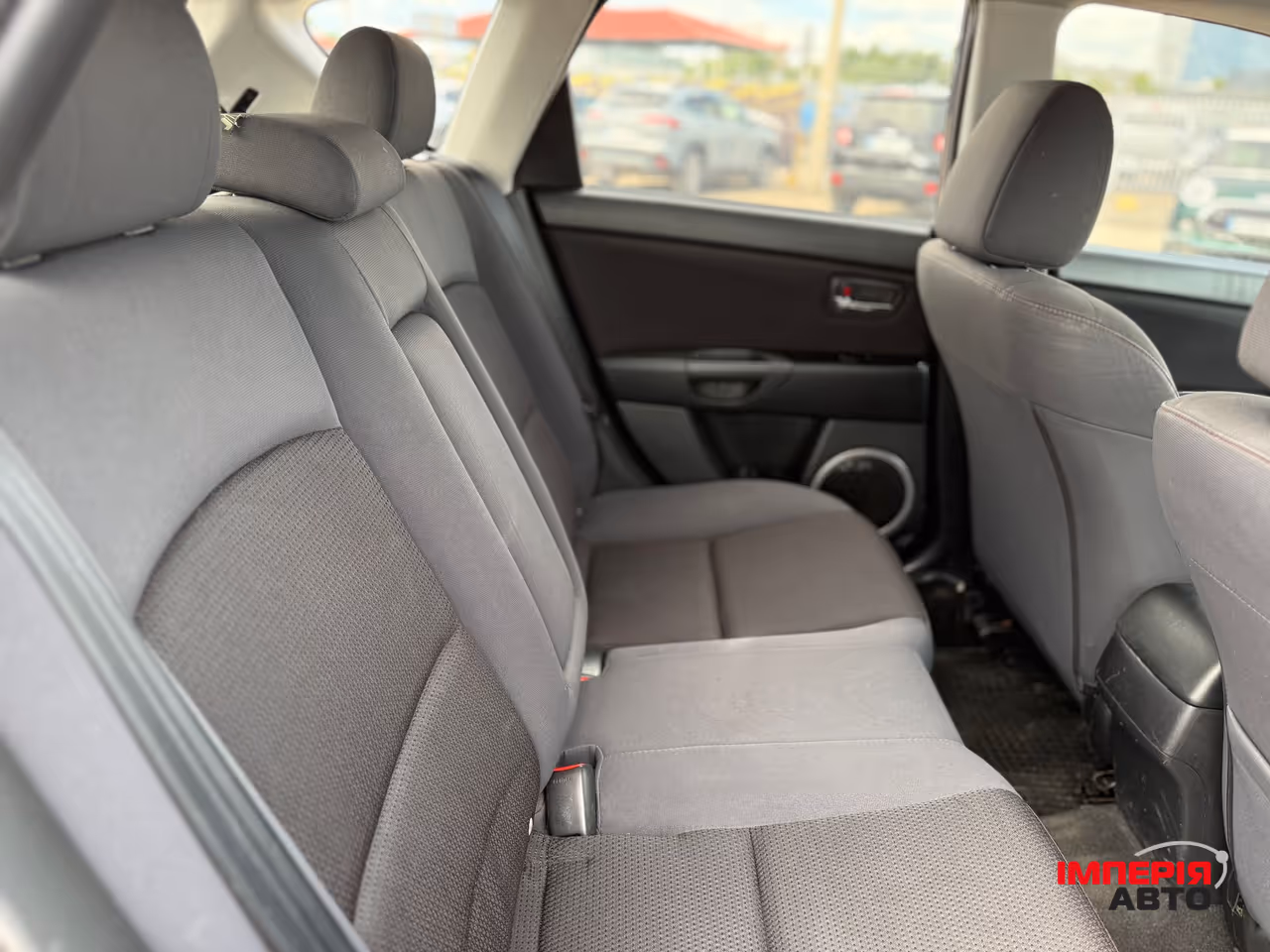 Mazda 3 - фото 12