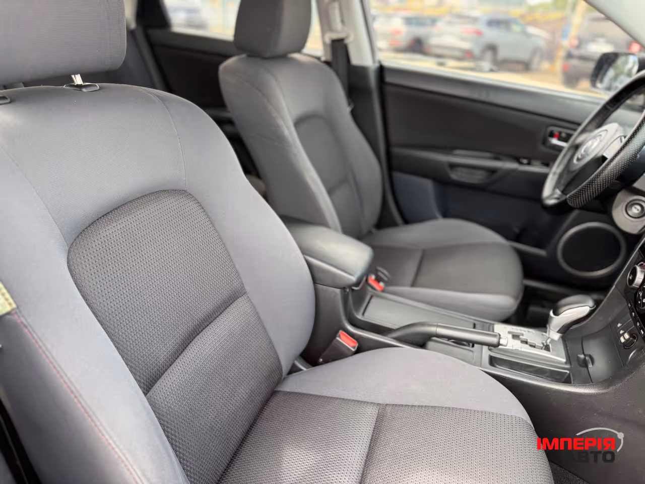 Mazda 3 - фото 11