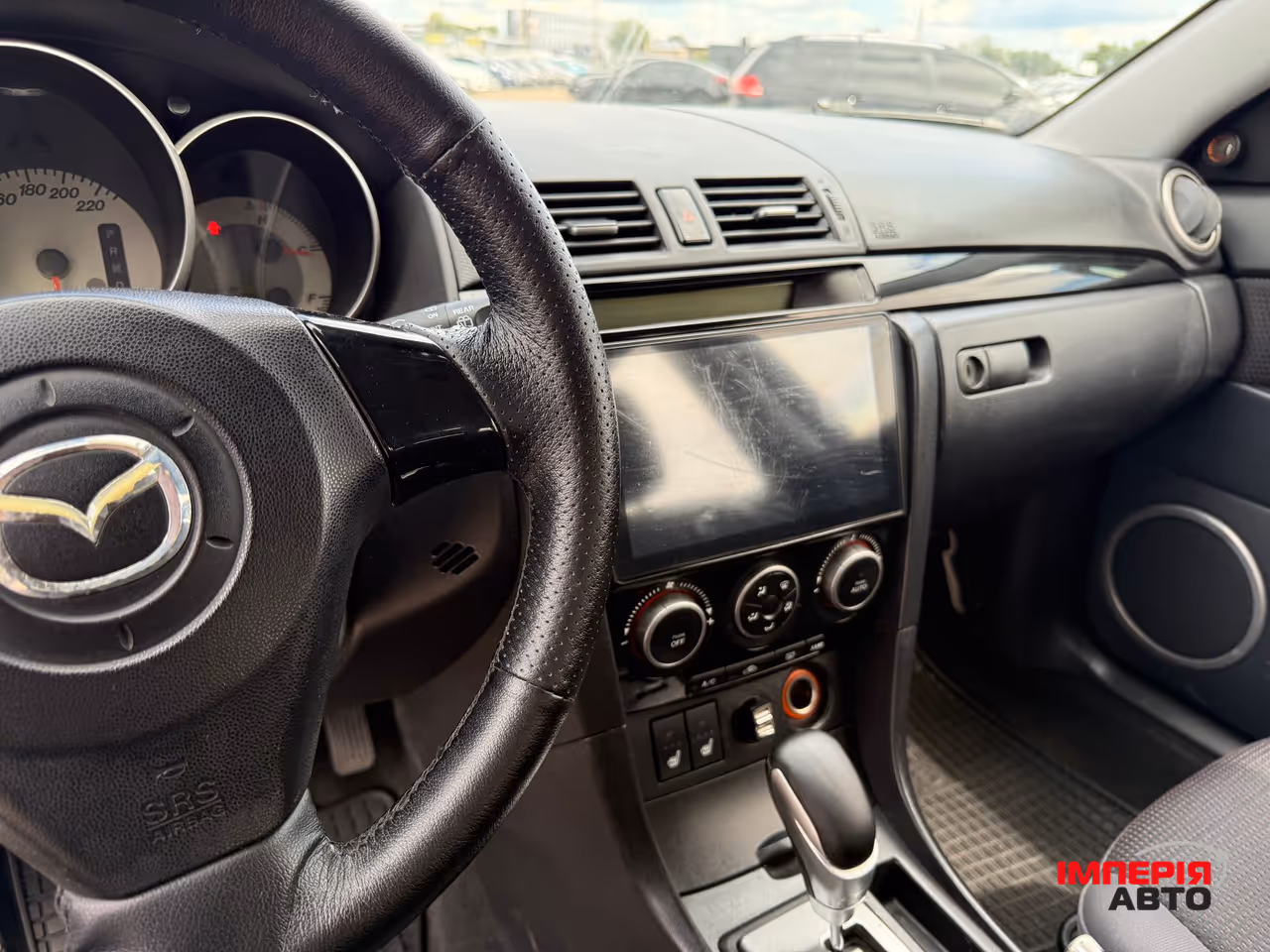 Mazda 3 - фото 8