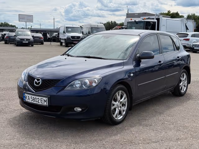 Mazda 3 - фото 1