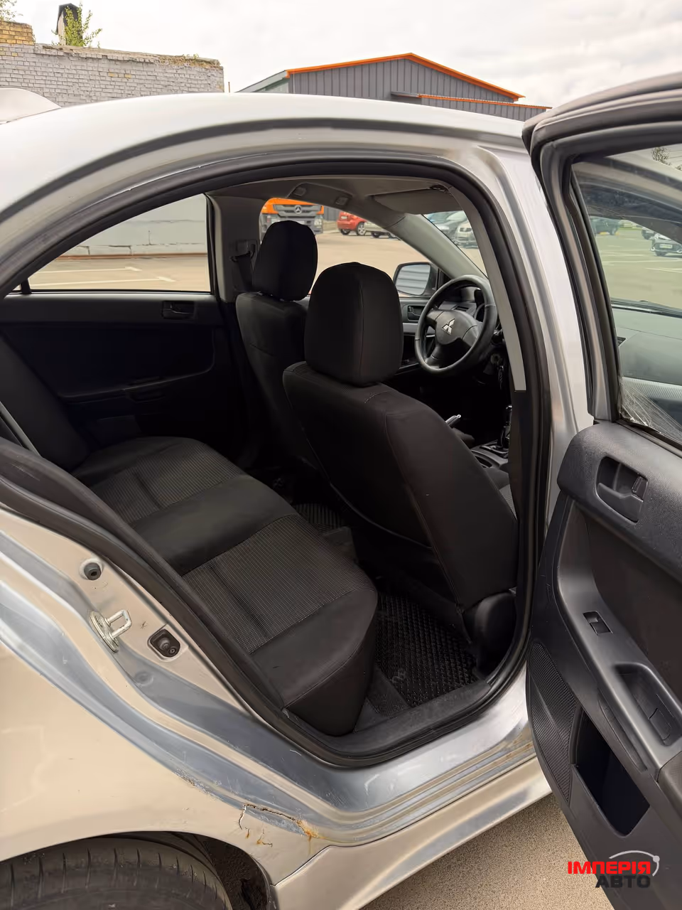 Mitsubishi Lancer - фото 11