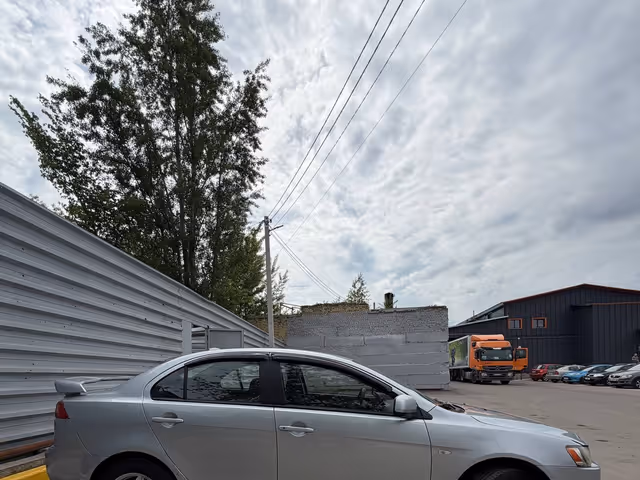 Mitsubishi Lancer - фото 5