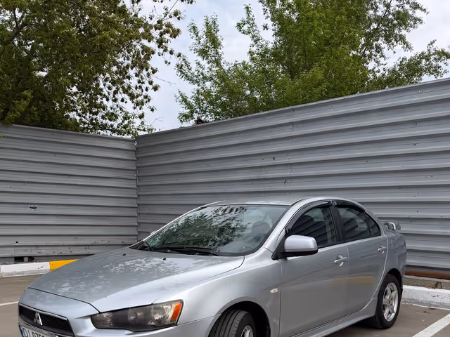 Mitsubishi Lancer - фото 1