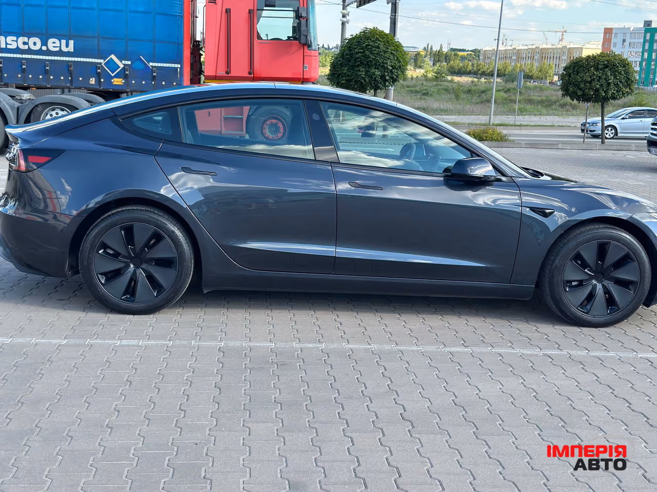 Tesla Model 3 - фото 11