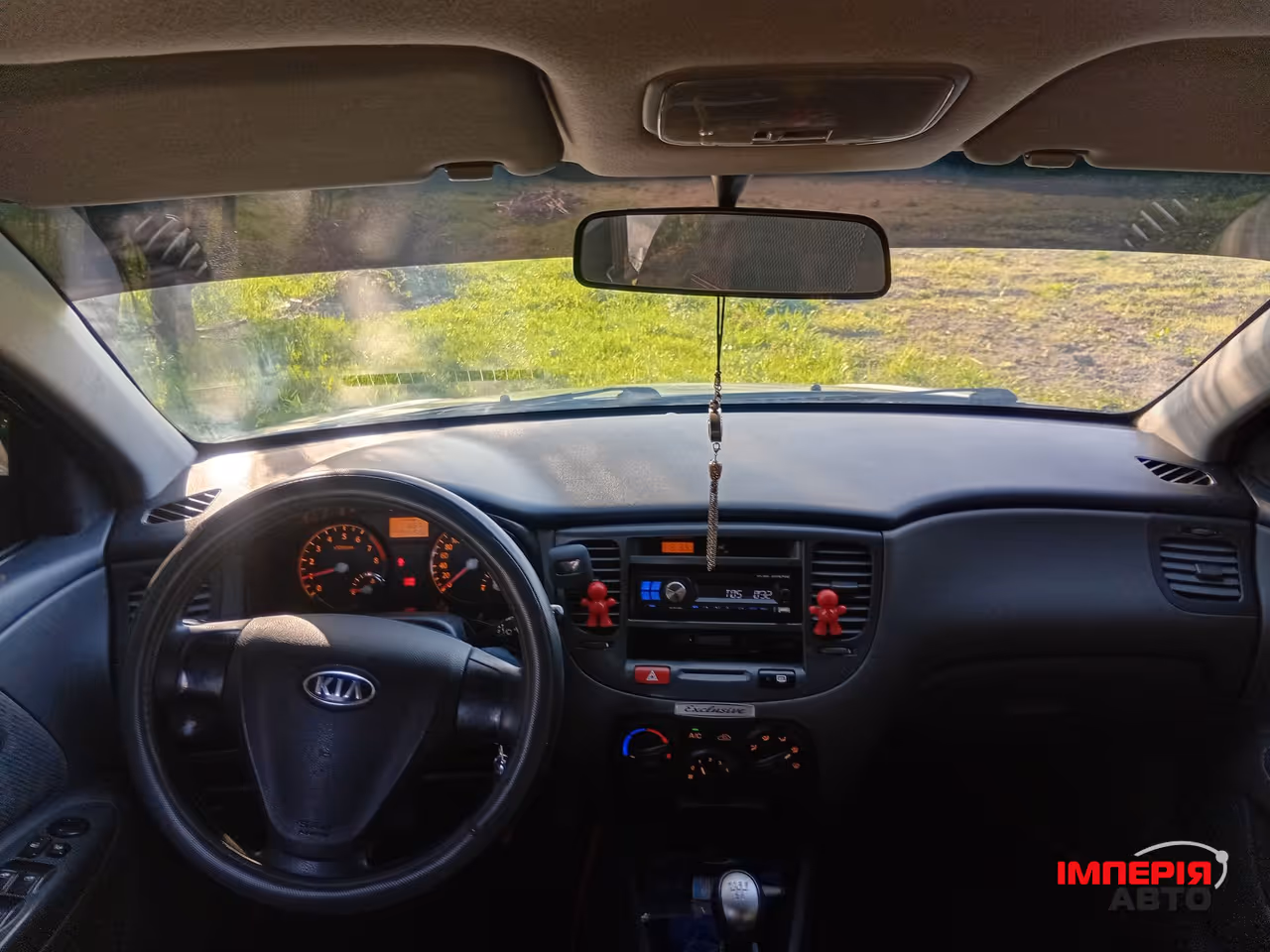 Kia Rio - фото 8