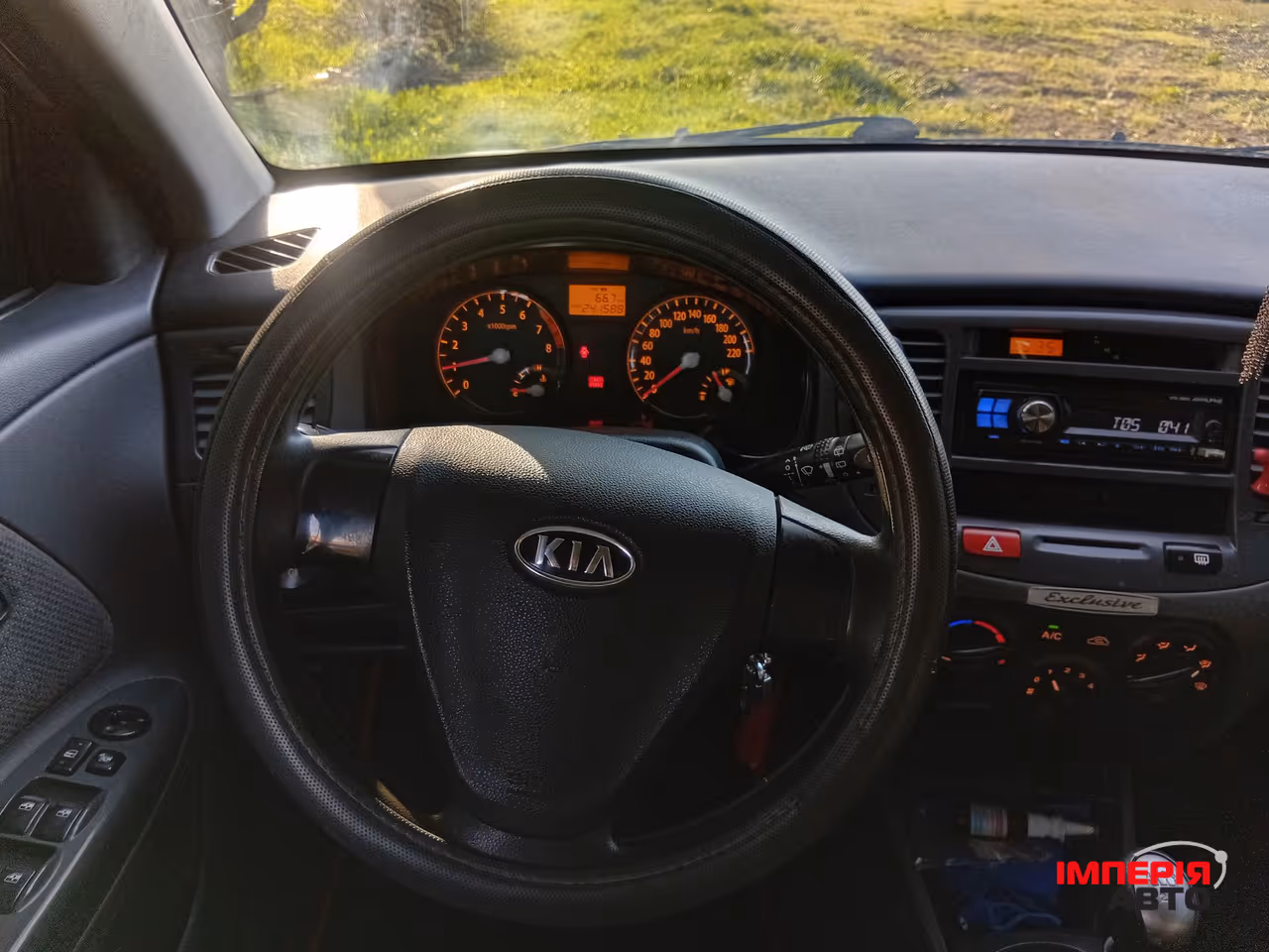 Kia Rio - фото 10