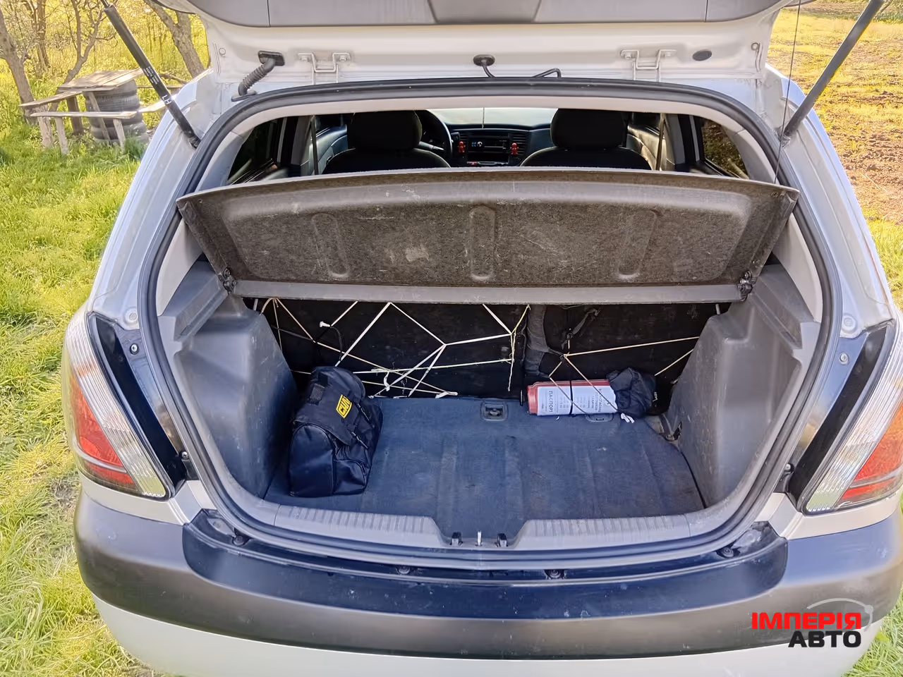 Kia Rio - фото 11