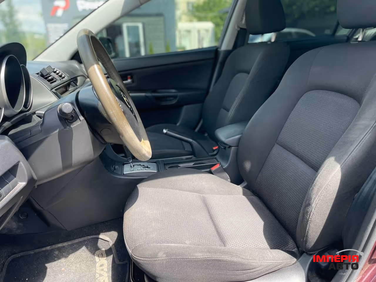 Mazda 3 - фото 8
