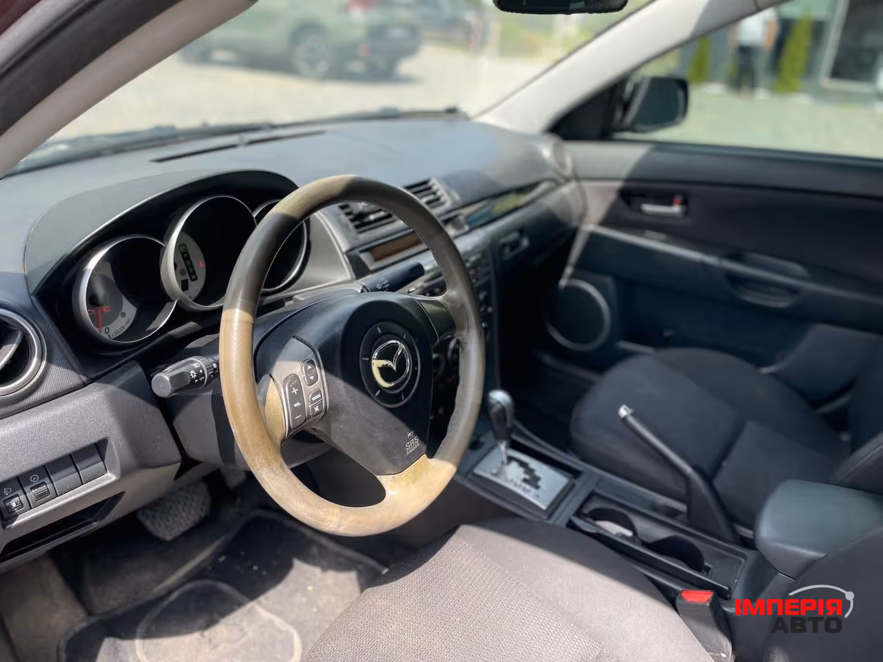 Mazda 3 - фото 7