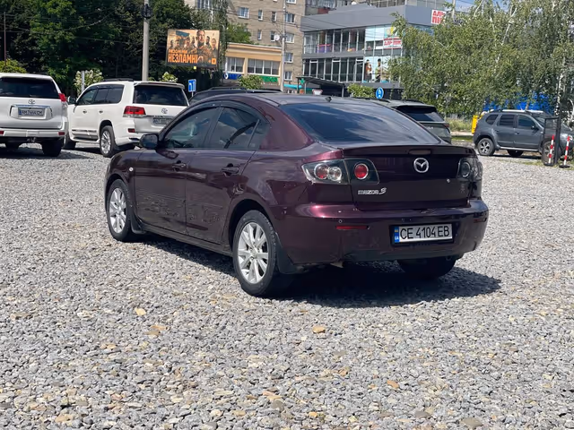 Mazda 3 - фото 4