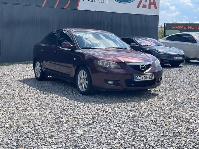 Mazda 3 - фото 3