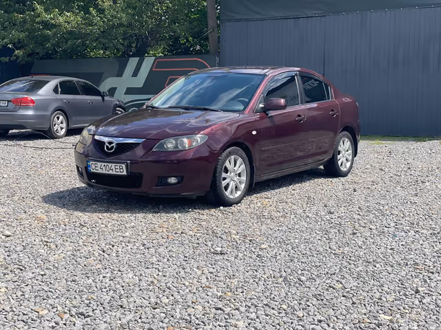 Mazda 3 - фото 1