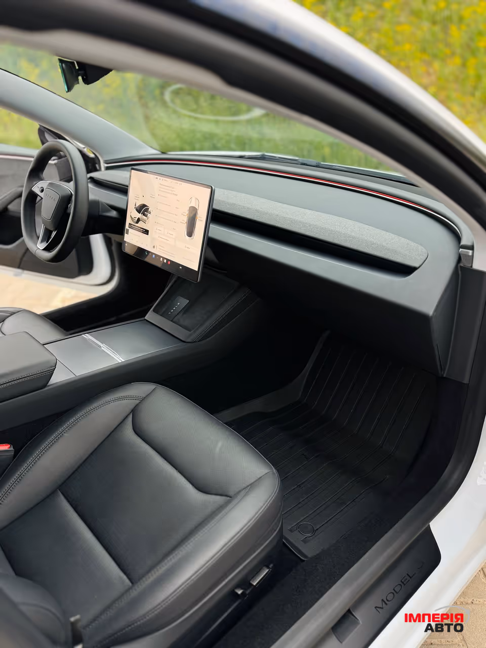 Tesla Model 3 - фото 38