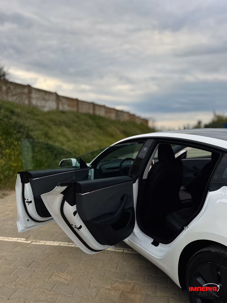 Tesla Model 3 - фото 35