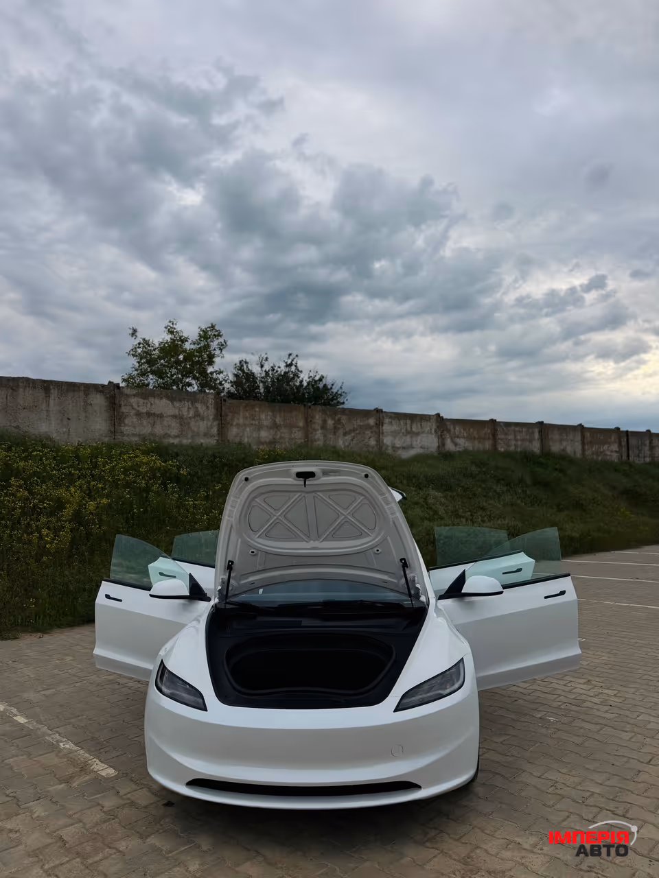 Tesla Model 3 - фото 12