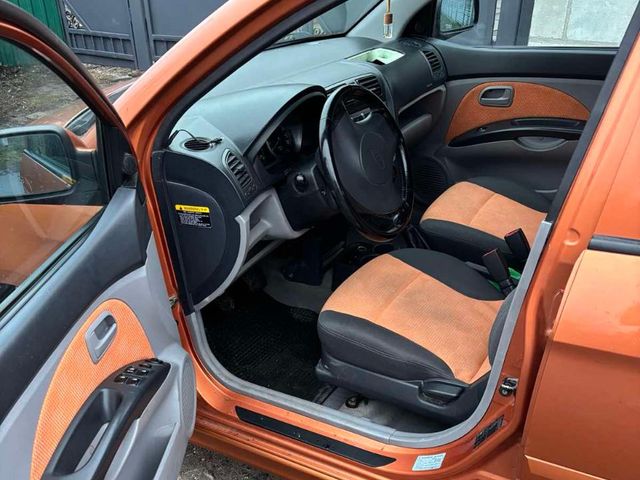 Kia Picanto - фото 5