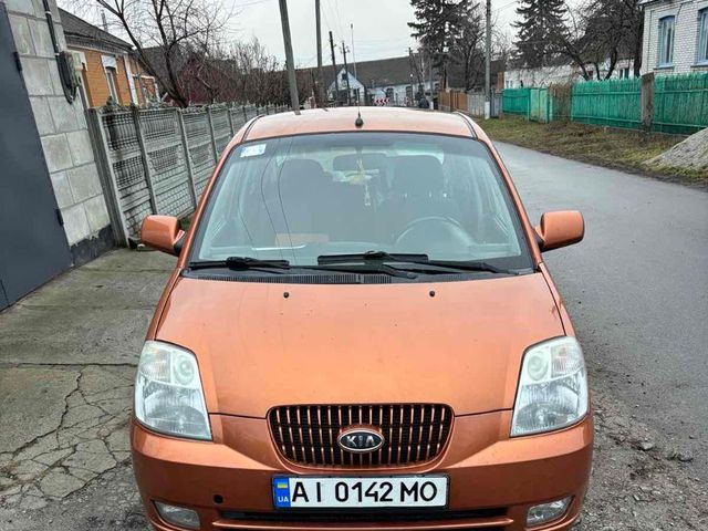 Kia Picanto - фото 1