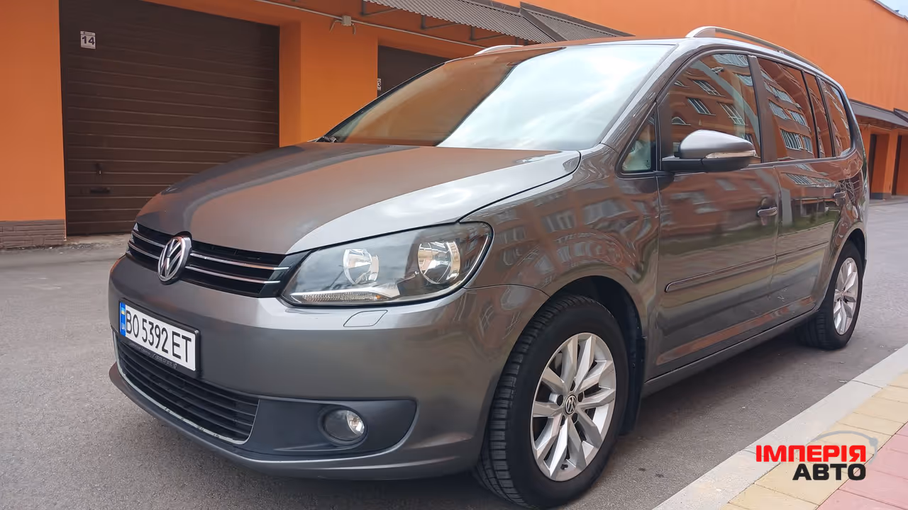 Volkswagen Touran - фото 3