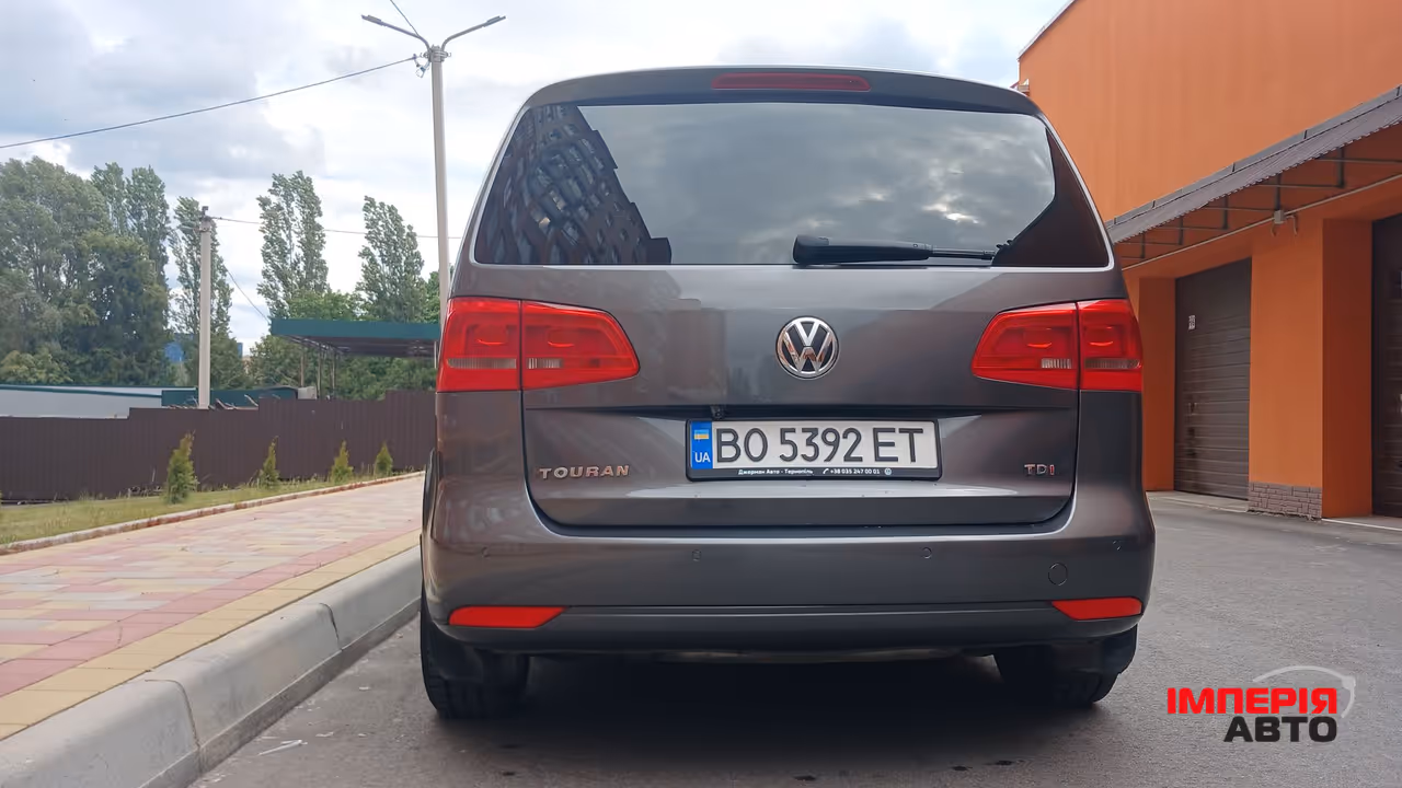 Volkswagen Touran - фото 8