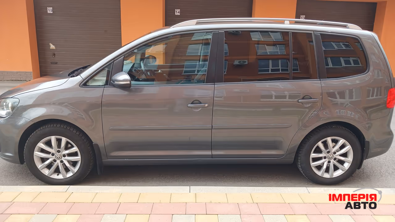 Volkswagen Touran - фото 7