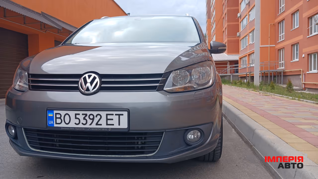 Volkswagen Touran - фото 4