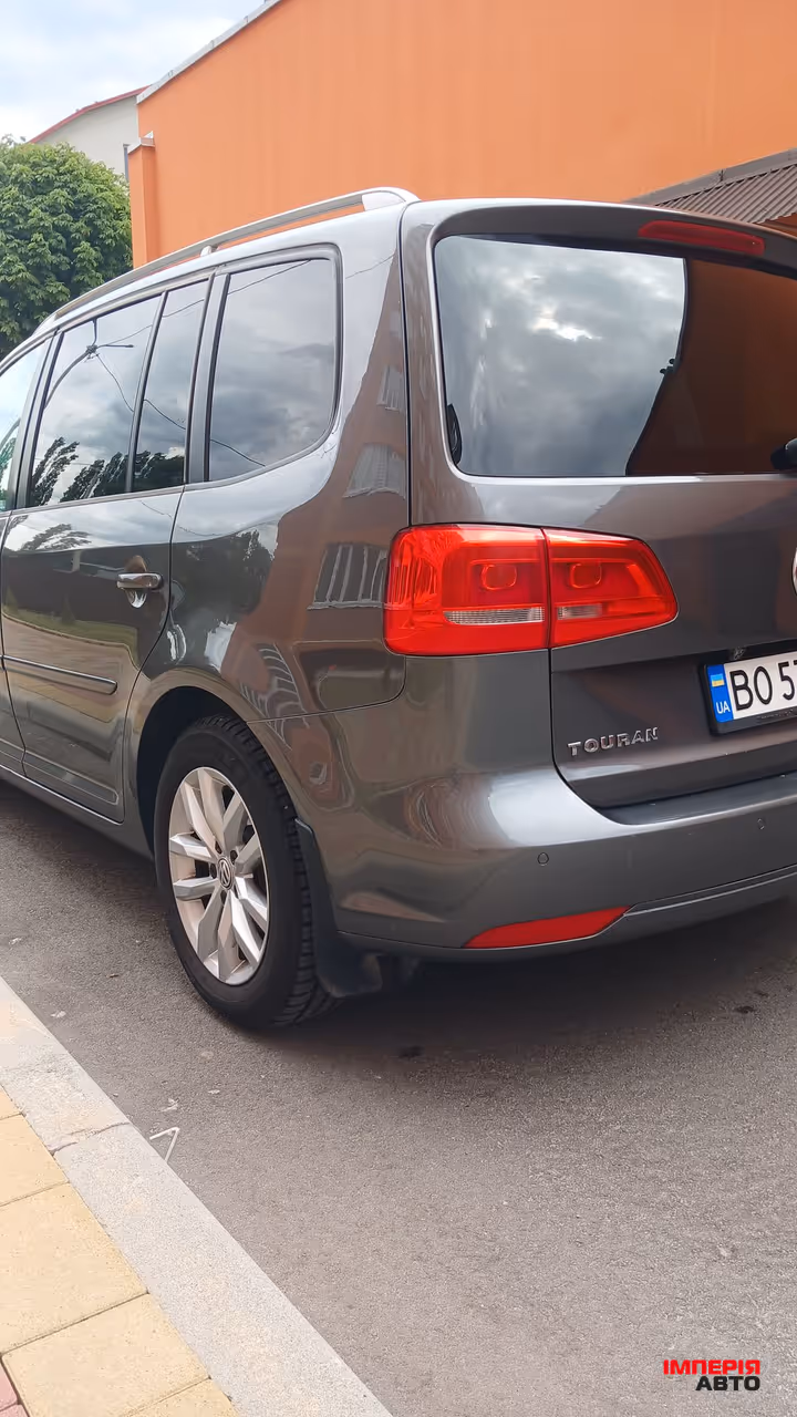 Volkswagen Touran - фото 5
