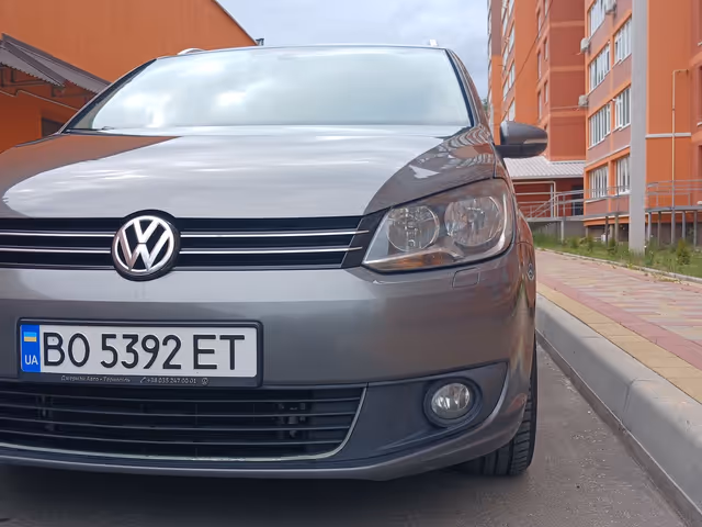 Volkswagen Touran - фото 4