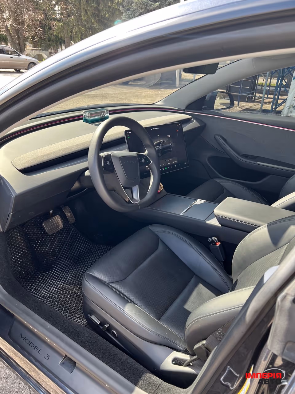 Tesla Model 3 - фото 12