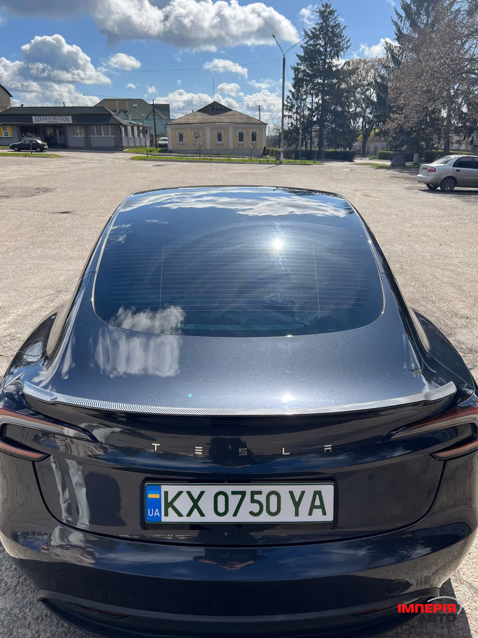 Tesla Model 3 - фото 10