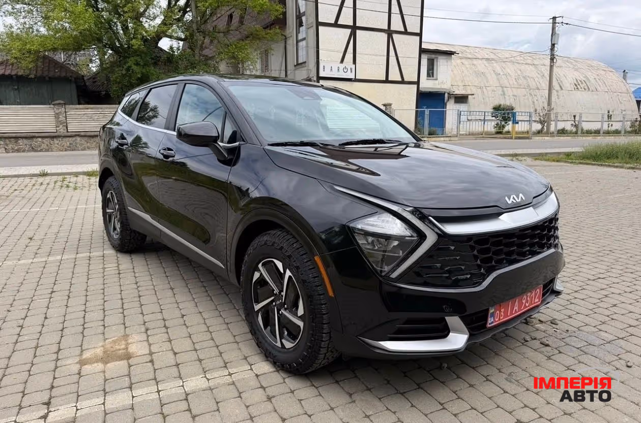 Kia Sportage - фото 1