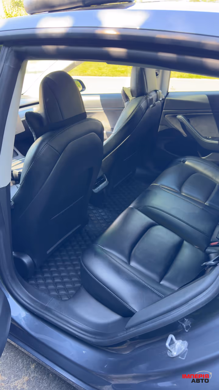 Tesla Model 3 - фото 10