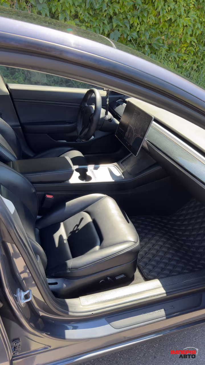 Tesla Model 3 - фото 12