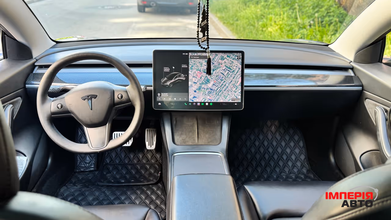 Tesla Model 3 - фото 13