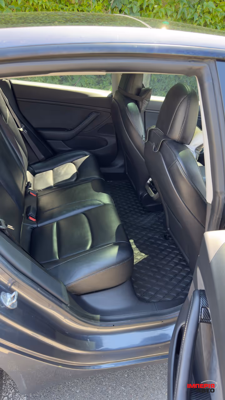 Tesla Model 3 - фото 11