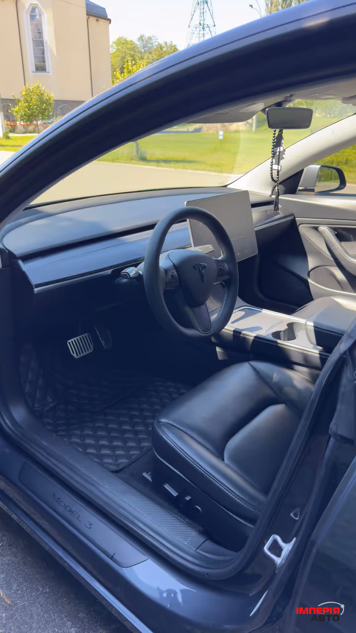 Tesla Model 3 - фото 9